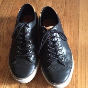 Black leather coach sneakers